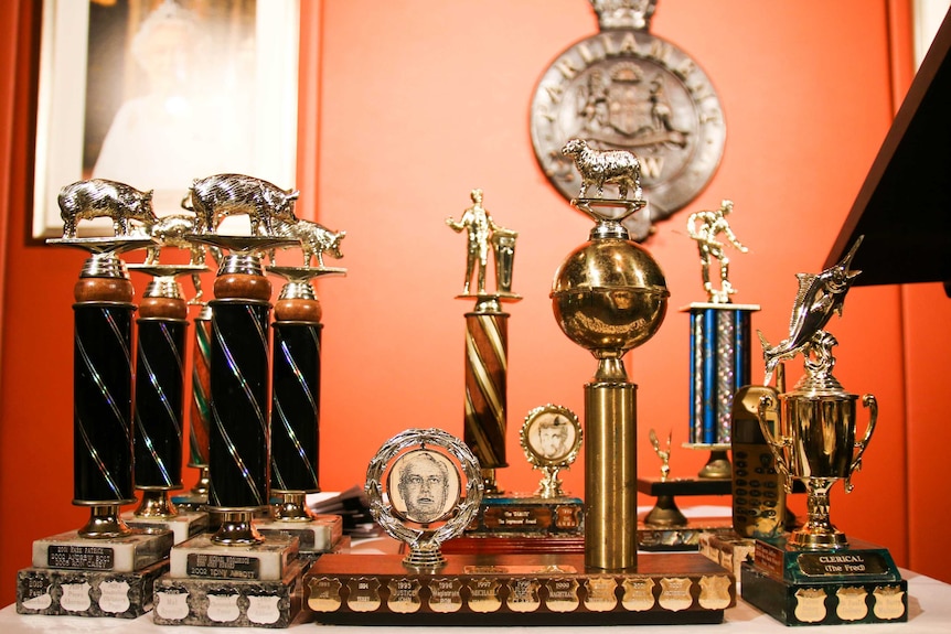 Ernie Awards trophies on a table.