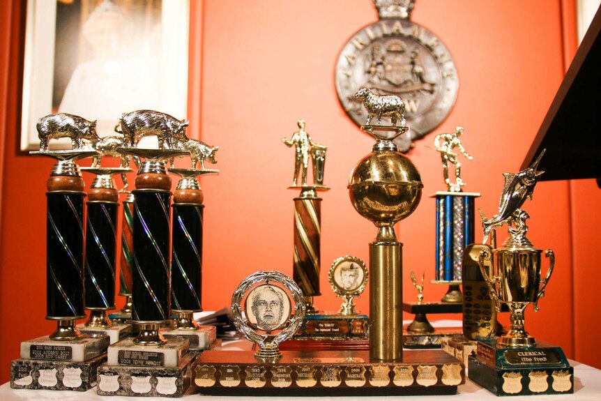 Ernie Awards trophies on a table.