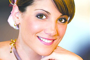 A headshot of Claudia La Bella