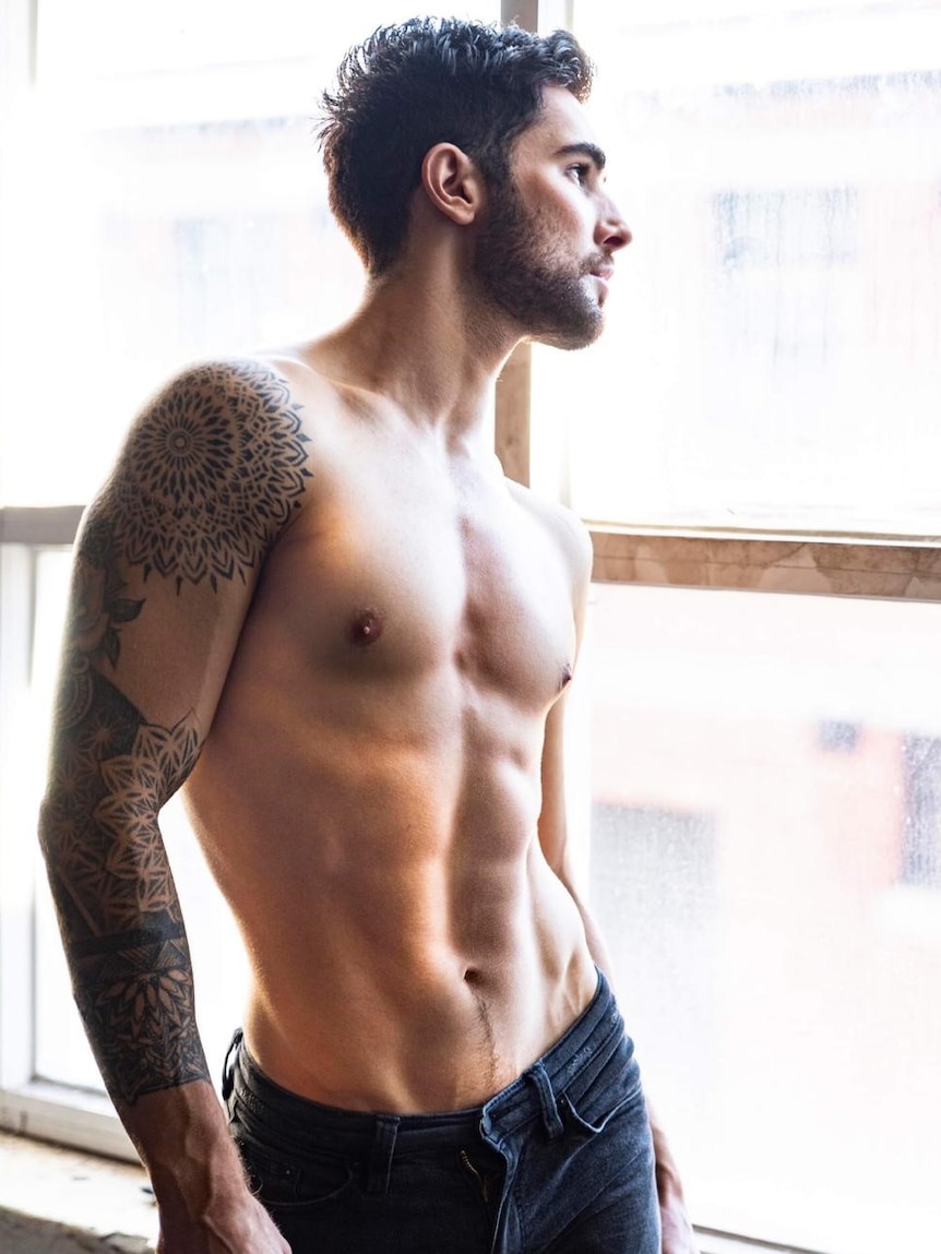 Picture of a shirtless man wearing jeans