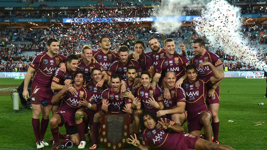 Maroons celebrate with the State of Origin shield
