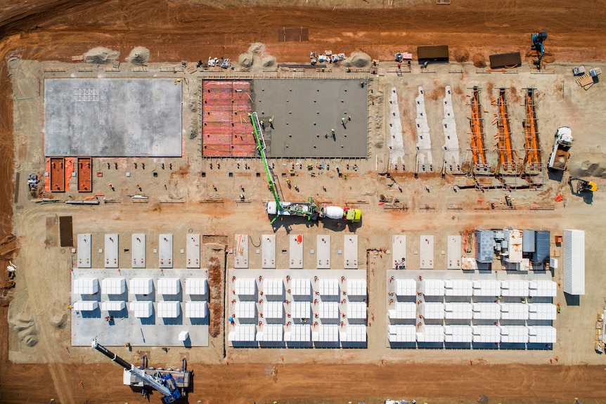 Aerial shot lookingn straight down at big battery project under construction