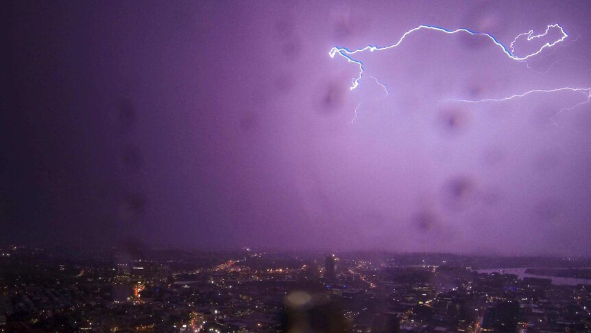 Lightning arcs across the sky during Brisbane storms.