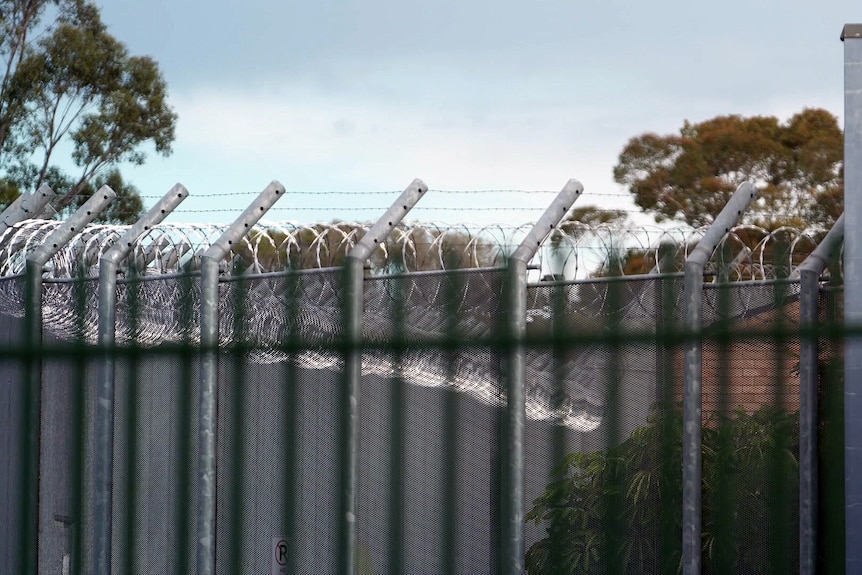 Wire fencing around a prison