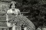 Alison Reid and Mike the leopard, Hobart's Beaumaris Zoo