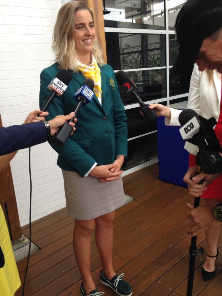 Swimmer Brittany Elmsie talks to the media at the unveiling of the Commonwealth Games team uniform.