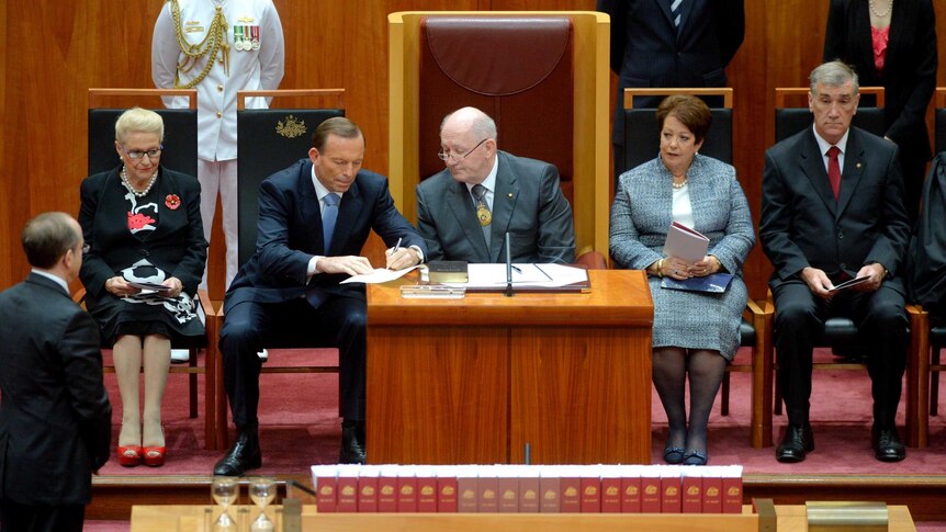 Prime Minister Tony Abbott, left, and Governor-General Sir Peter Cosgrove during swearing-in ceremony.