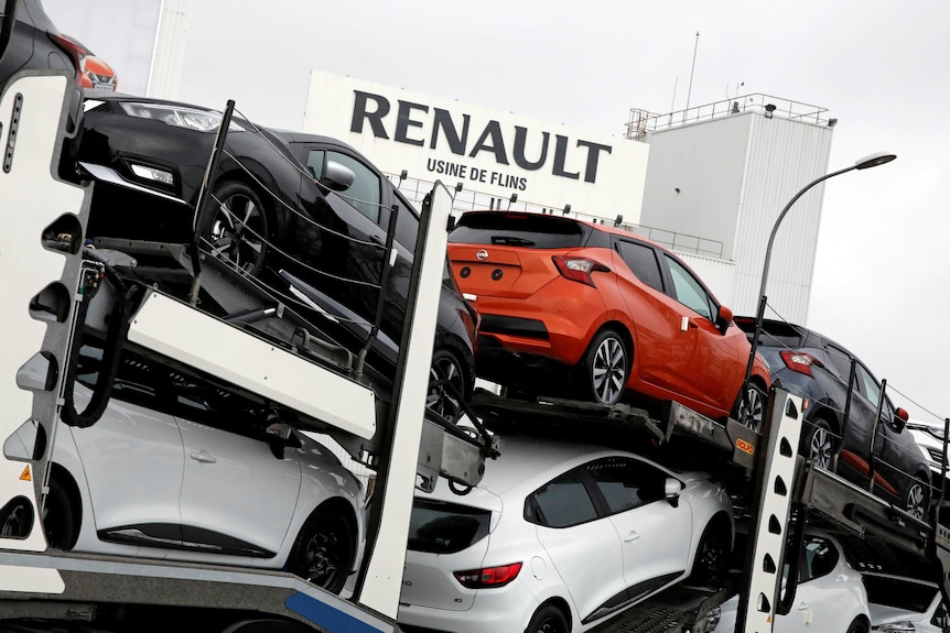 New Renault and Nissan automobiles are loaded onto a transporter at the Renault SA car factory in Flins, France.