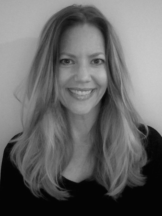 Black and white headshot of a young woman.