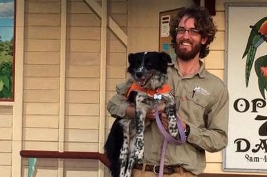 Anthony Schultz, from the University of the Sunshine Coast, with his koala tracking dog Maya.
