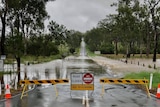 Water flowed onto roads at Boonah after days of rain in south-east Queensland.