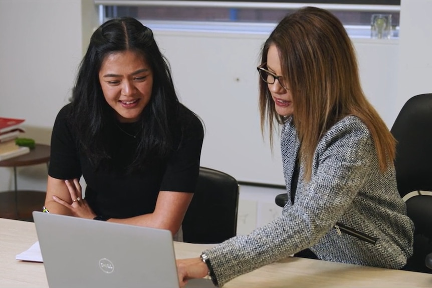 Simone Tregeagle, chief officer of rt health, talking with colleague Merrilyn Lee.