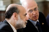 'Developing strategies': Henry Paulson (r) says the US Government will move to take ownership stakes in struggling American banks.