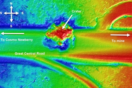 Infrared photo of a crater showing the hottest point of an explosion.