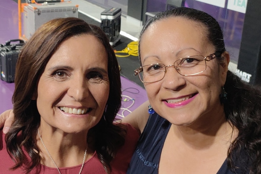 Two Indigenous women smiling for a photo