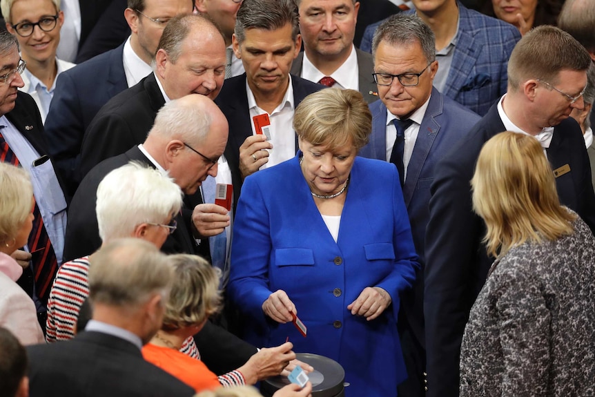 German Chancellor Angela Merkel votes against the bill to legalise same-sex marriage in Berlin, Germany.