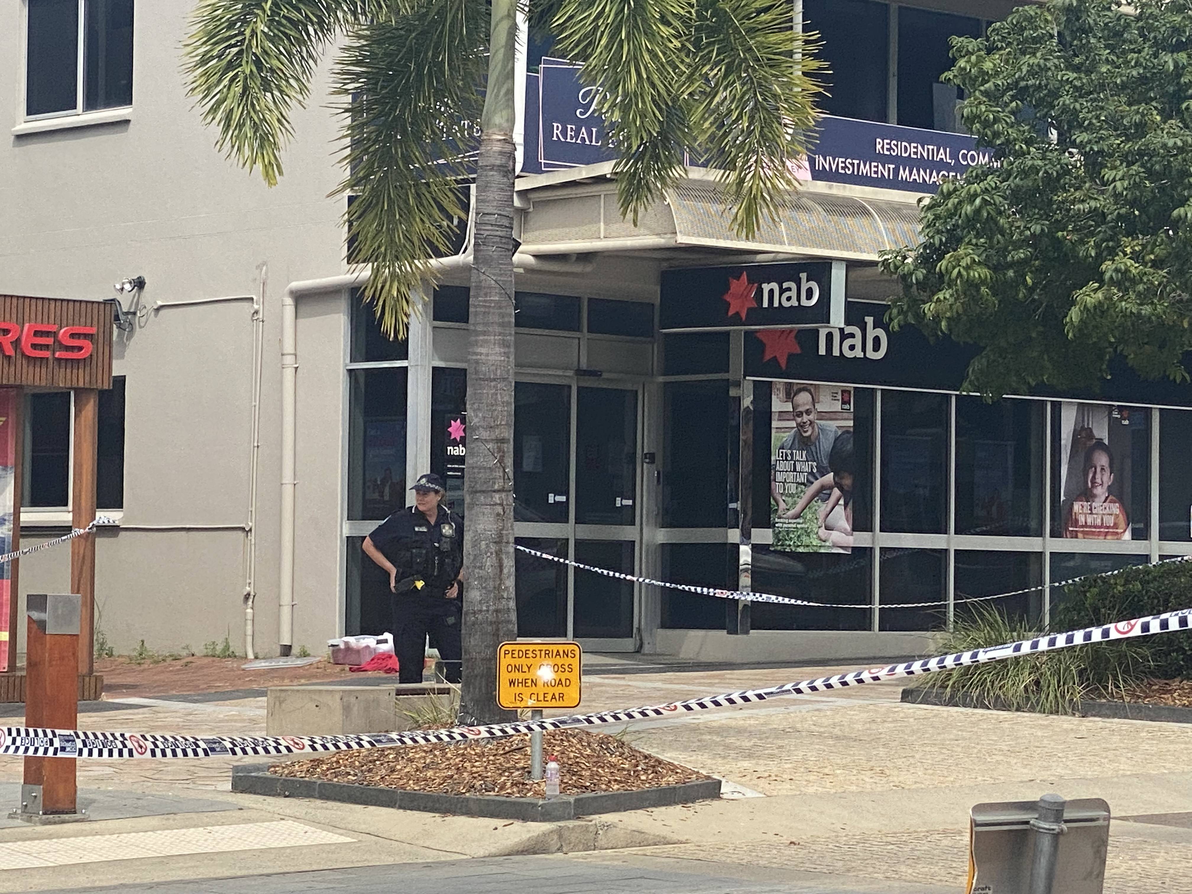 Police guard the crime scene at Airlie Beach