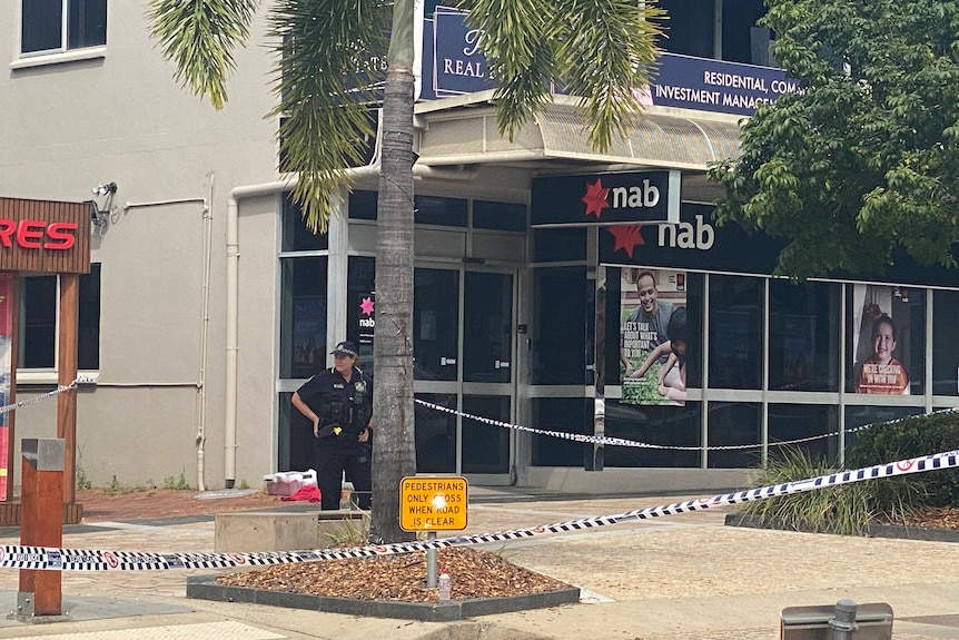 Police guard the crime scene at Airlie Beach