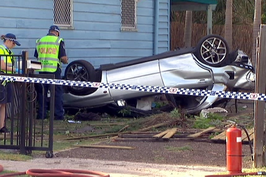 A car lies on its roof at Silkstone.