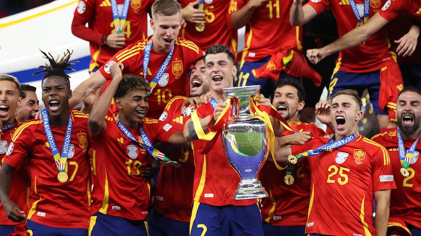 Alvaro Morata and Spain lift the Euro 2024 trophy