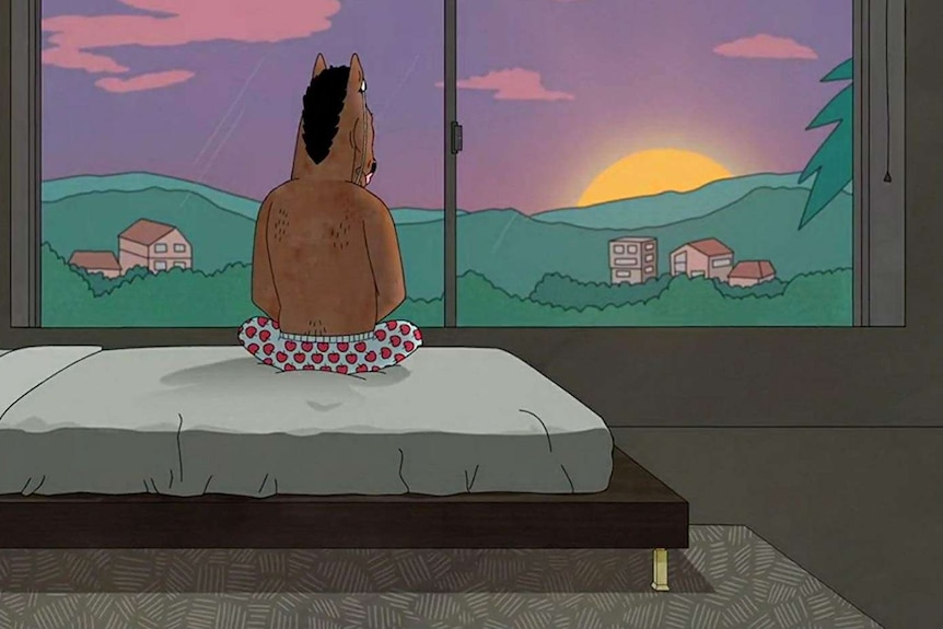 BoJack Horseman sits on his bed in his mansion