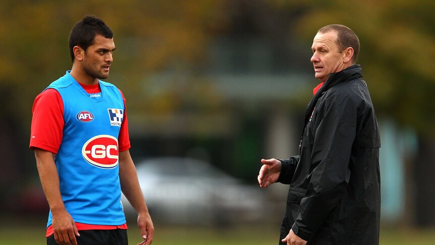 Set for a move ... Ken Hinkley (R) pictured working with Karmichael Hunt