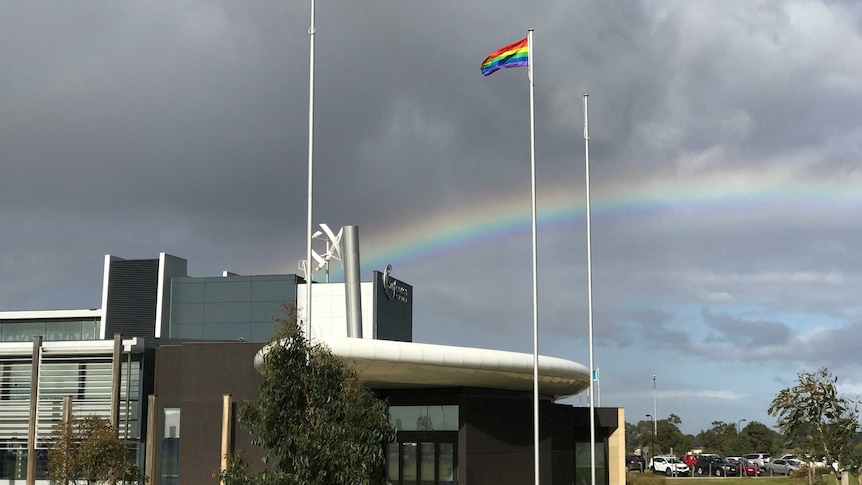 A rainbow flag in support of marriage equality flys over the Victorian Surf Coast Shire building.