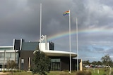 A rainbow flag in support of marriage equality flys over the Victorian Surf Coast Shire building.