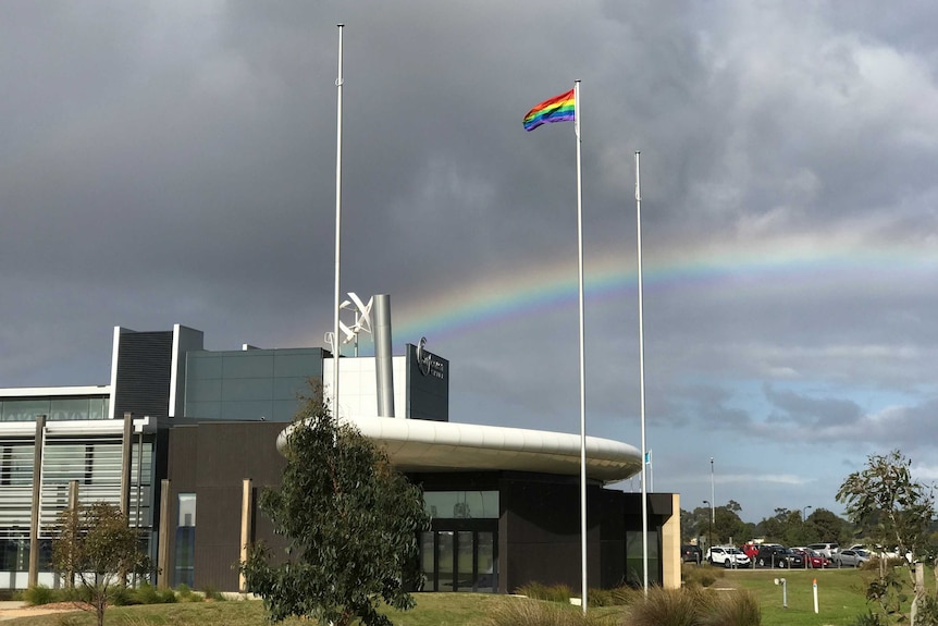 A rainbow flag in support of marriage equality flys over the Victorian Surf Coast Shire building.