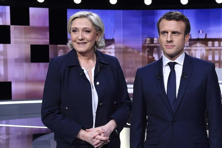Marine Le Pen (L) and Emmanuel Macron (R) ahead of their Presidential debate