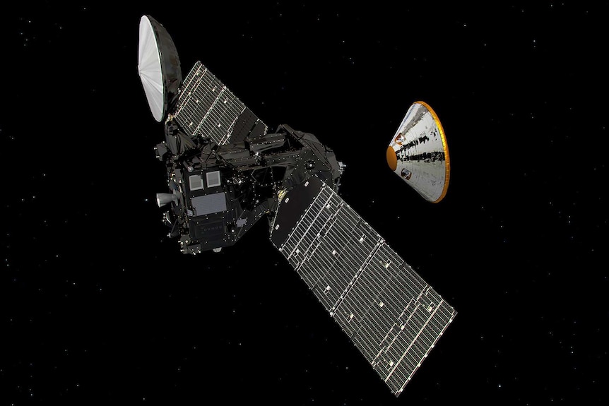 A large satellite with rectangular wings is in space, with a small dome spacecraft detaching from it