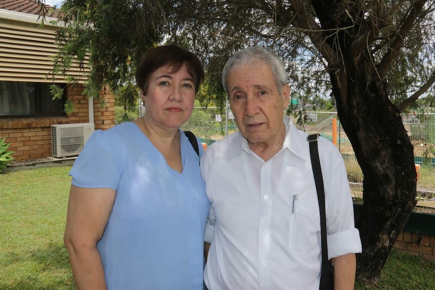 Jeannette Ulloa with her father Pedro standing outside of their unit complex.