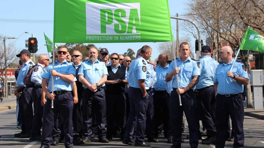 Prison guards gather ahead of march