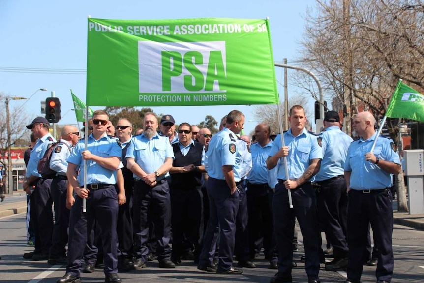 Prison guards gather ahead of march