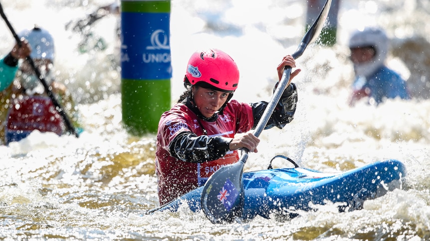 Noemie Fox competes in the kayak cross