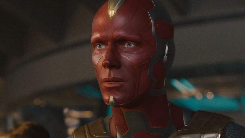 Vision, a red-coloured machine man, with the mind stone.