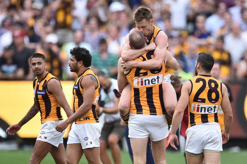 Sam Mitchell celebrates with David Hale