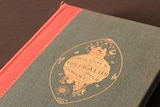 An old cookbook on show at an exhibition in Hobart.
