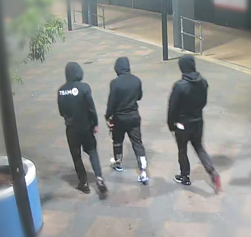 CCTV of three hooded men 