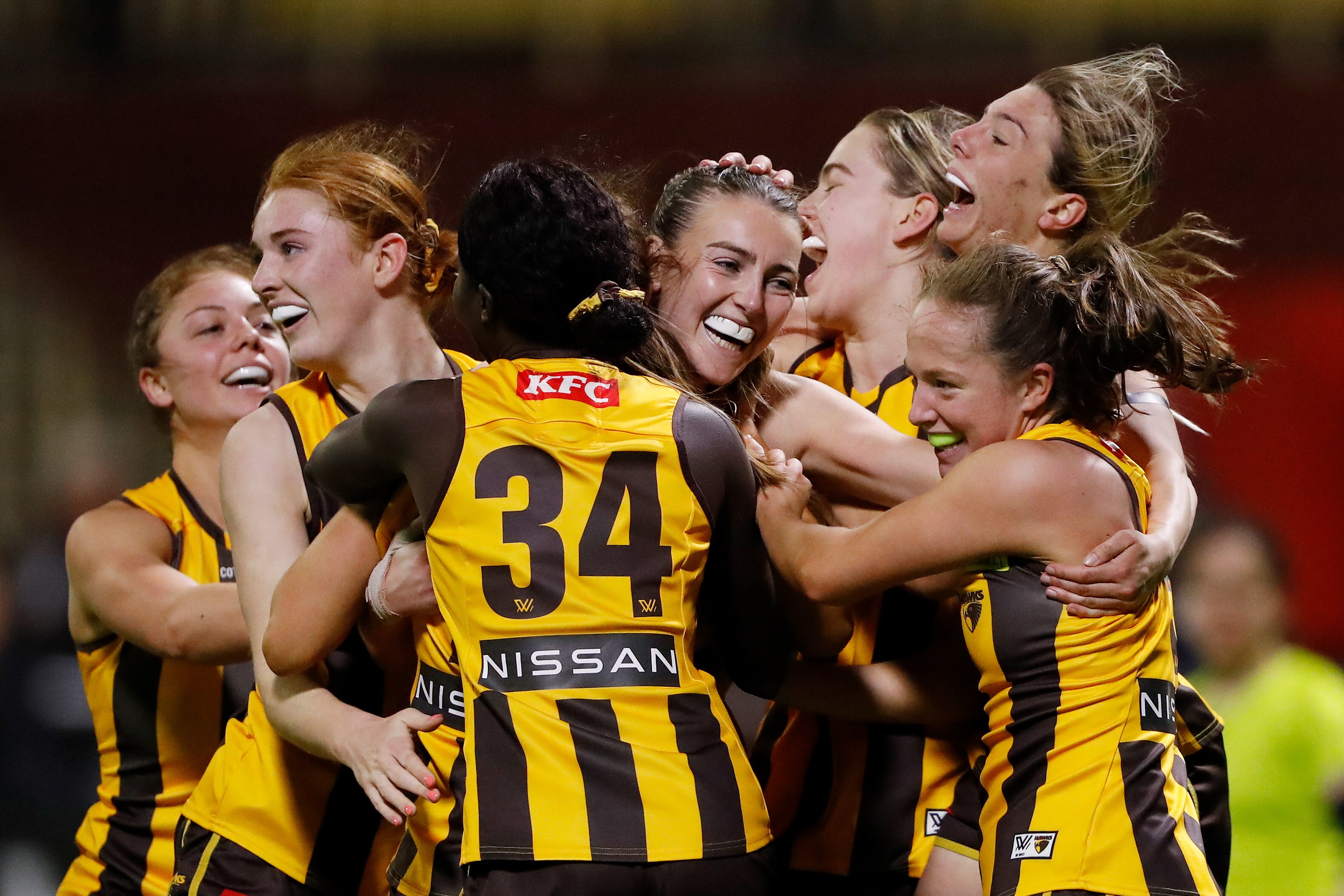 Aine McDonagh is hugged by her teammates