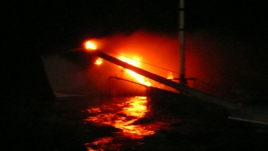 Burning Yacht Statue Bay