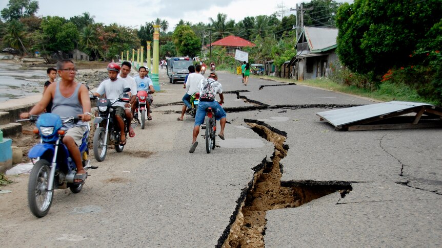Road cracked open after Philippines quake