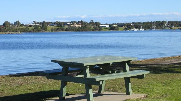 A picnic table is shown by the water at Paynesville in eastern Victoria.