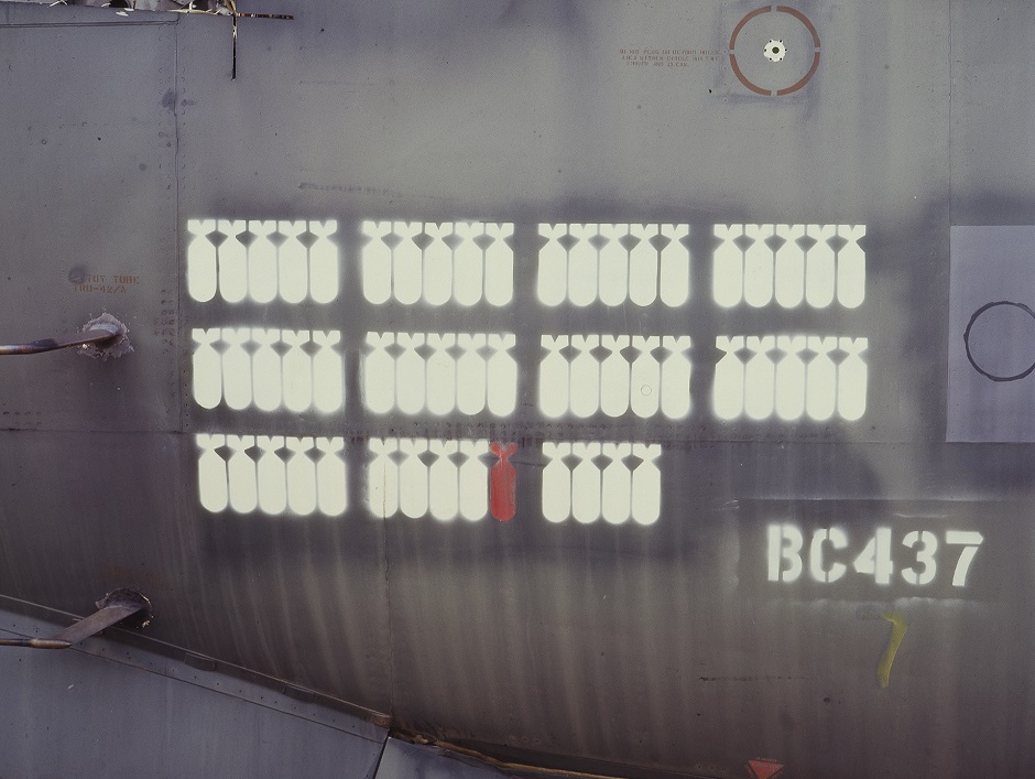 A stencil showing the number of B52 bombs dropped from a carrier.