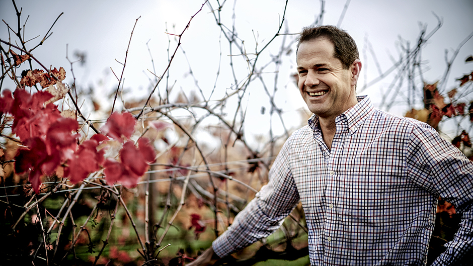 Brett McClen, chief viticulturist at Brown Brothers, in front of a vineyard, 2016