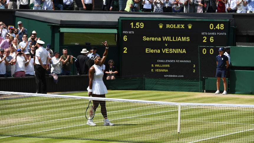 Serena Williams salutes the crowd after beating Elena Vesnina