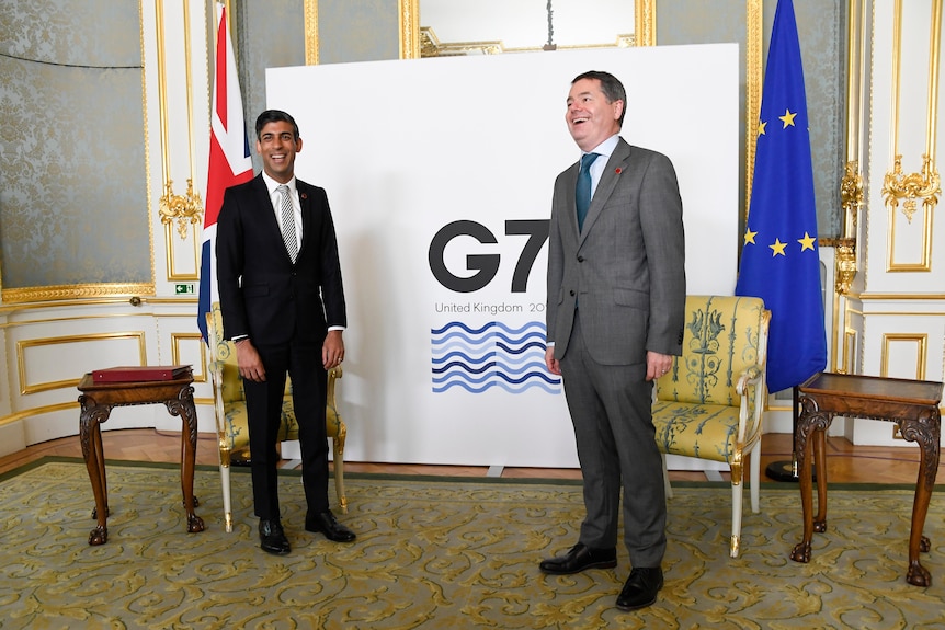 Britain's Chancellor of the Exchequer Rishi Sunak, left, poses for photos with Eurogroup President Paschal Donohoe
