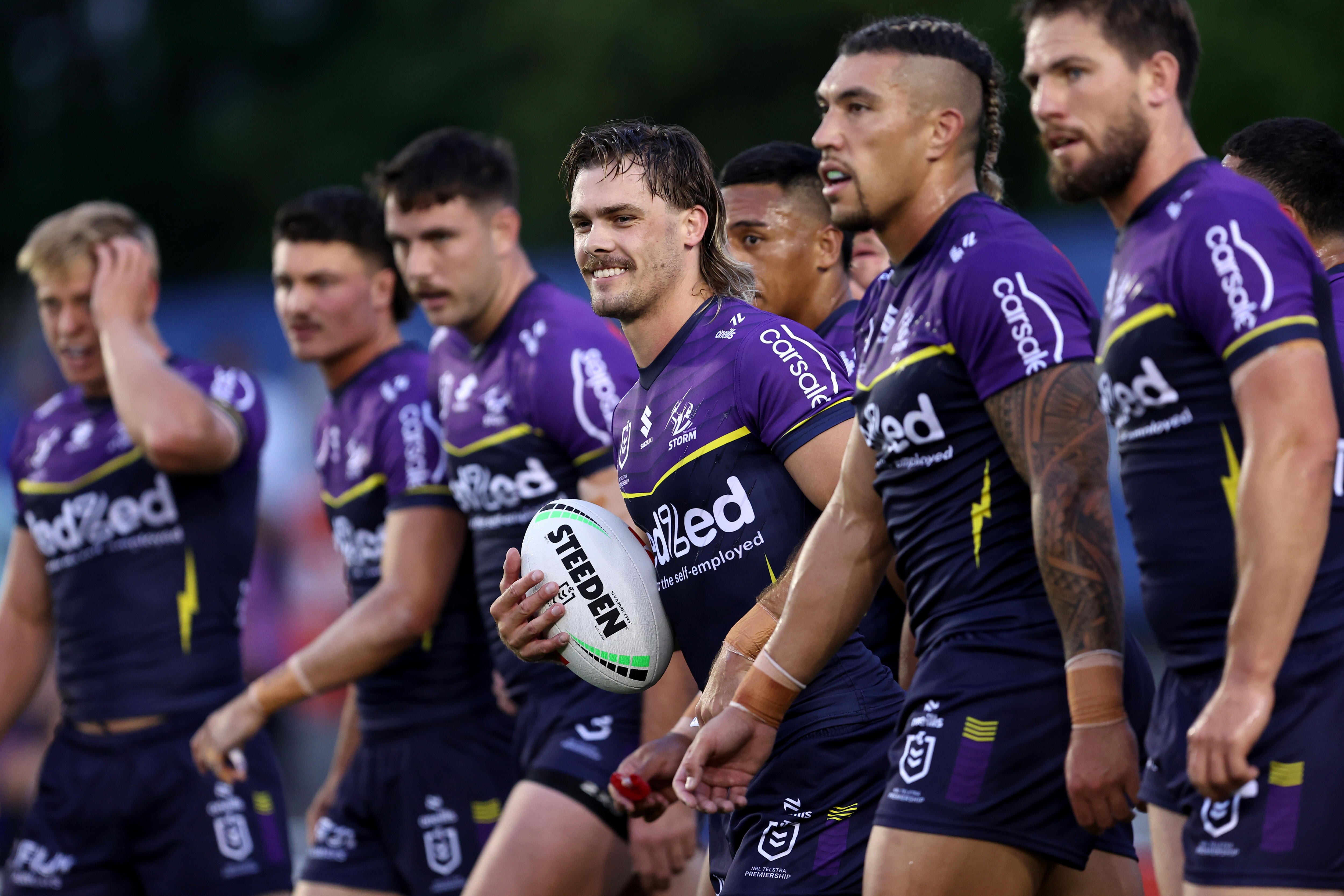 A man smiles during a rugby league match