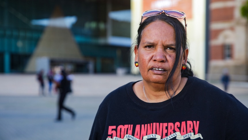 Megan Krakouer wears a shirt marking the 50th anniversary of the tent embassy