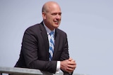 Transport Minister Dean Nalder rests on an overpass